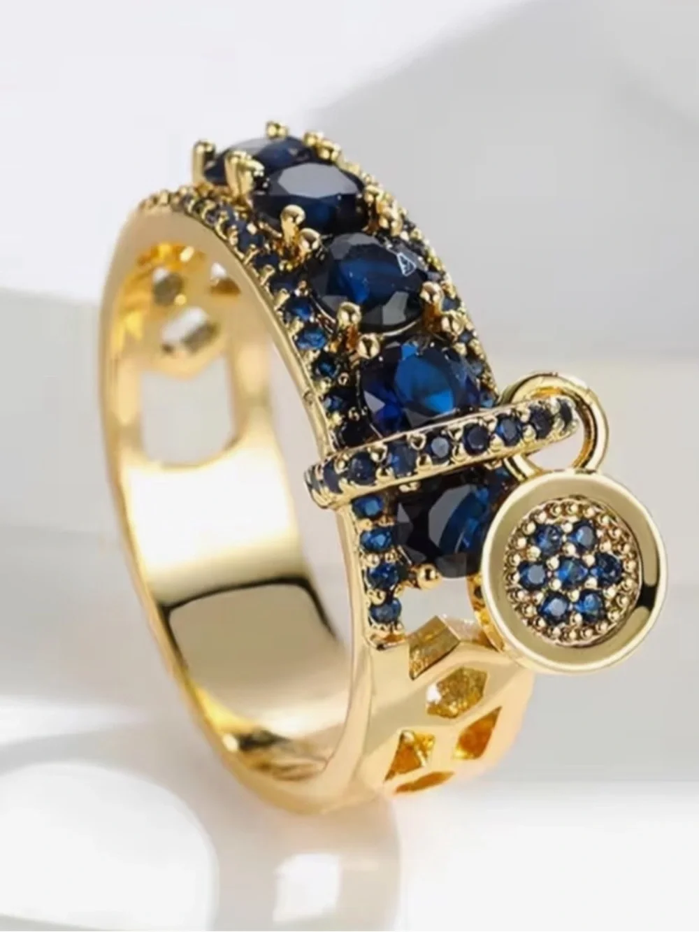 Golden Ring with Sapphire Blue Crystals and Charm